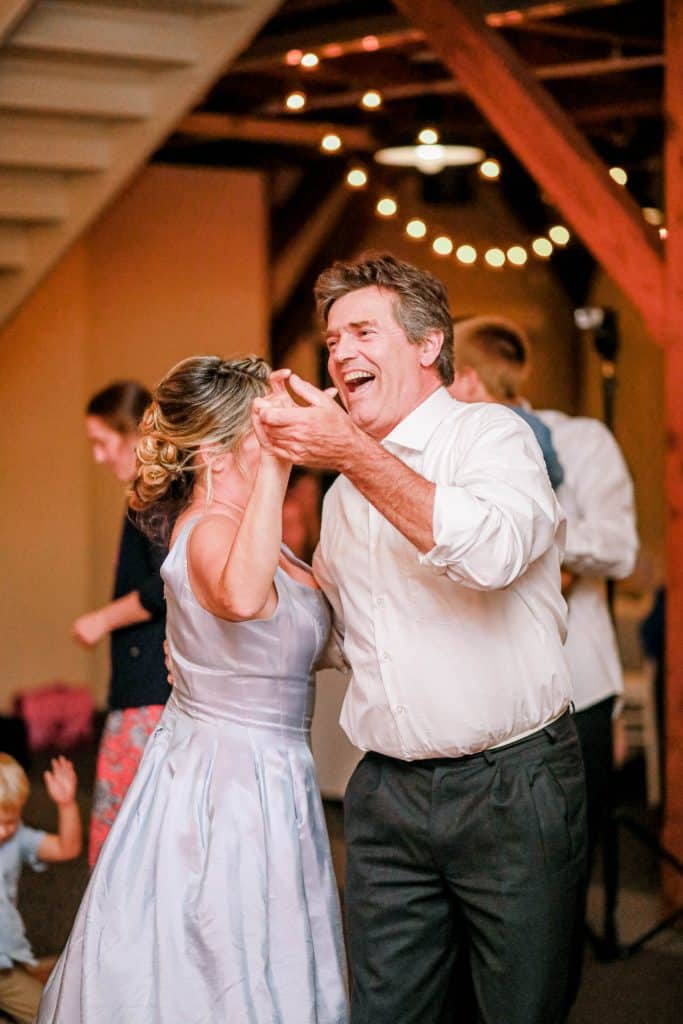bride dancing with her step father
