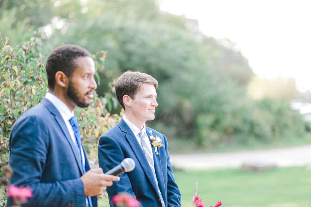 Groom with the preacher at the alter