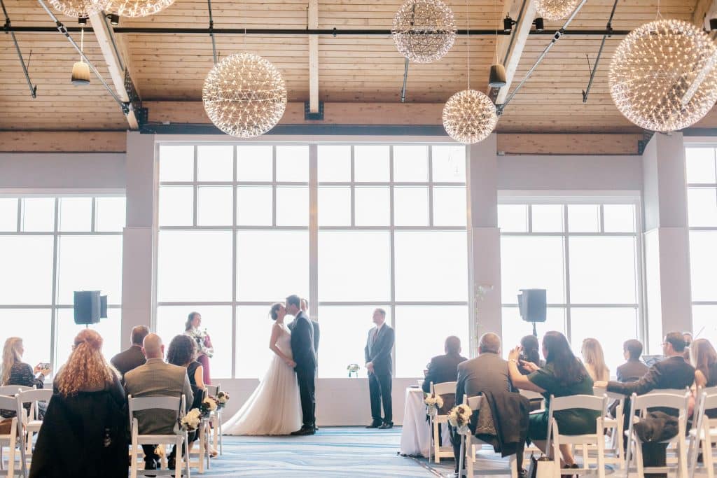 Bride and groom kissing at the Cliff House