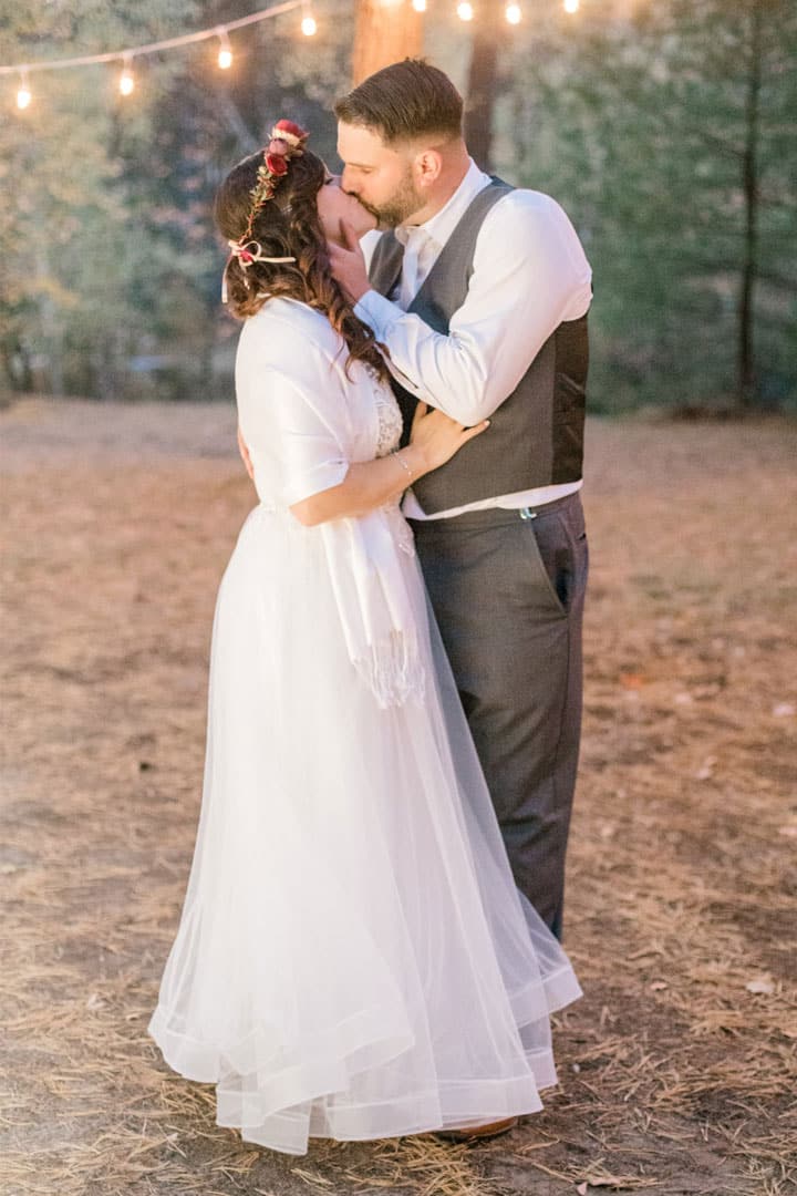 bride and groom kiss at york maine wedding taken by wedding photographer Catherine Gross