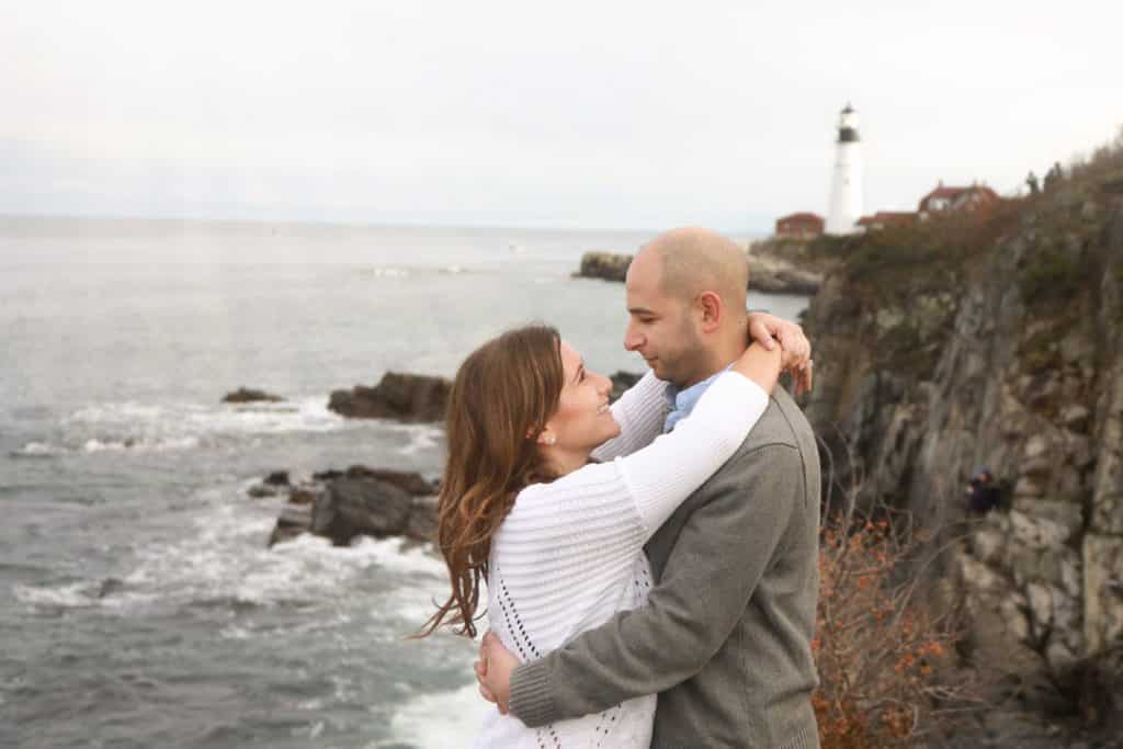 engaged couple maine lighthouse