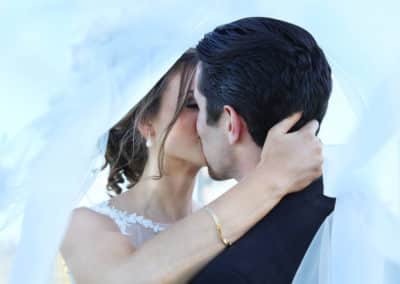 bride and groom kissing