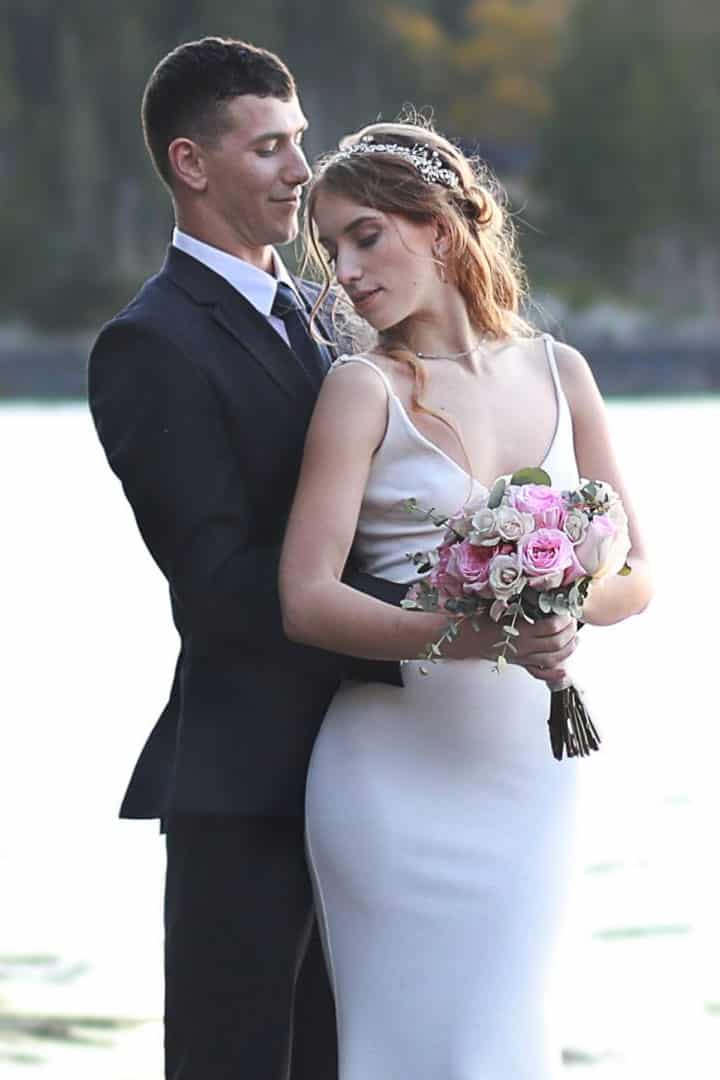 couple-on-maine-lake Bride and groom dip photo at Alamoosook lakeside inn
