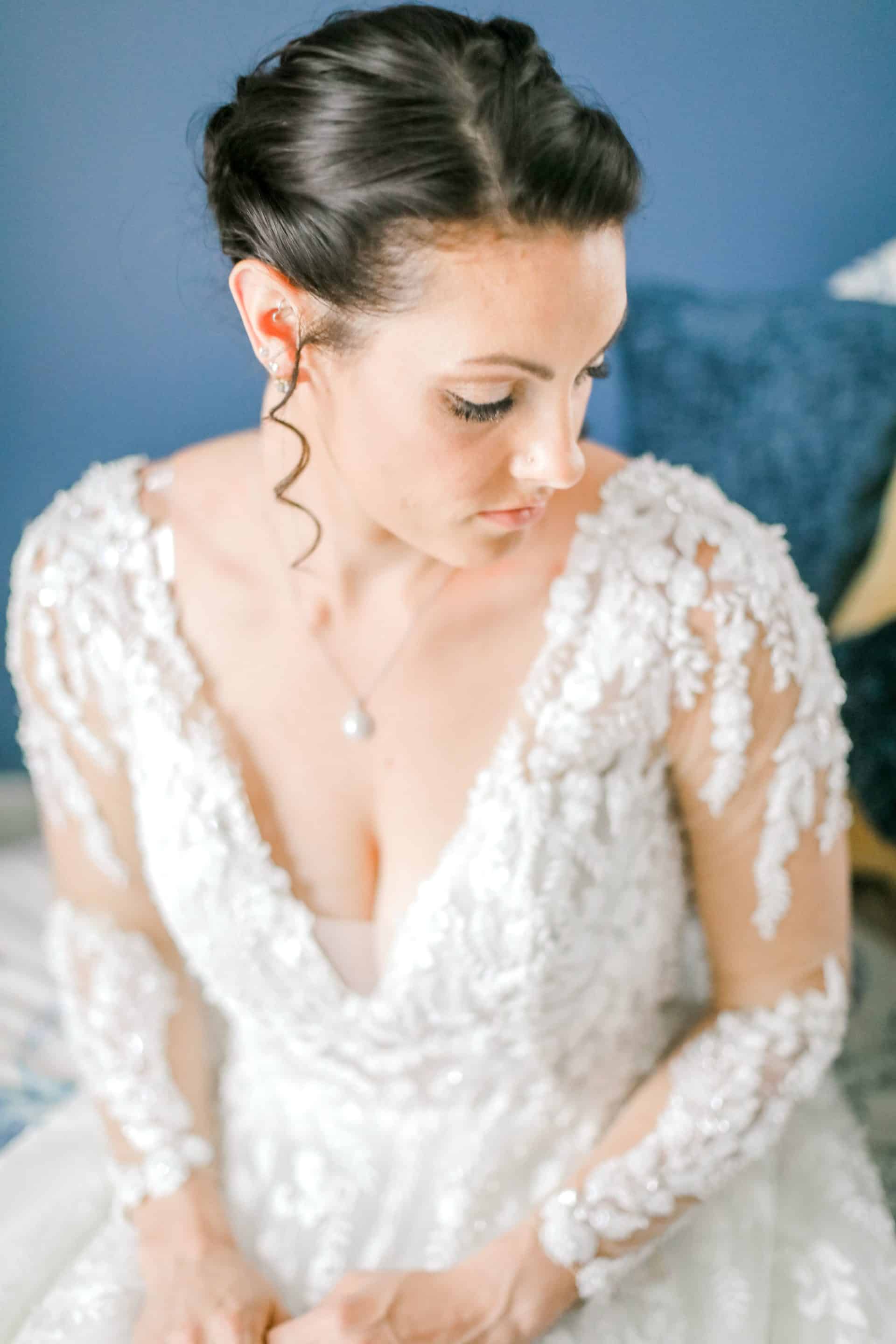 Bride getting her portrait taken by midcoast maine wedding photographer: Catherine J. Gross