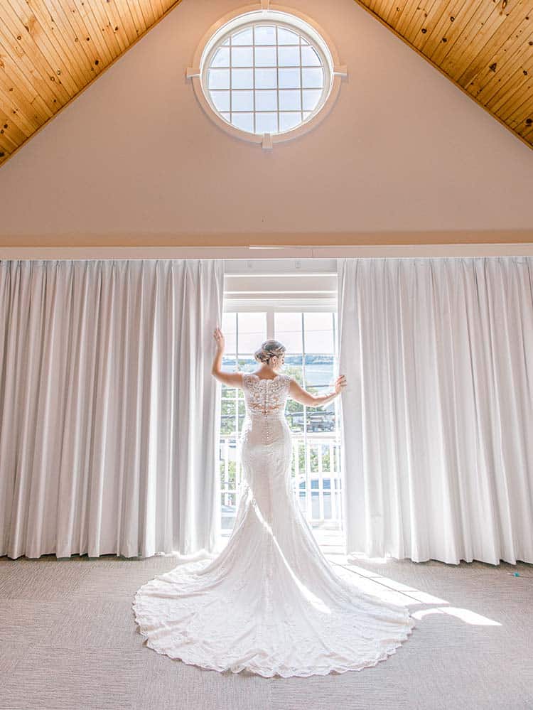 Catherine Gross photographs and films a bride beforea Rockland Maine wedding