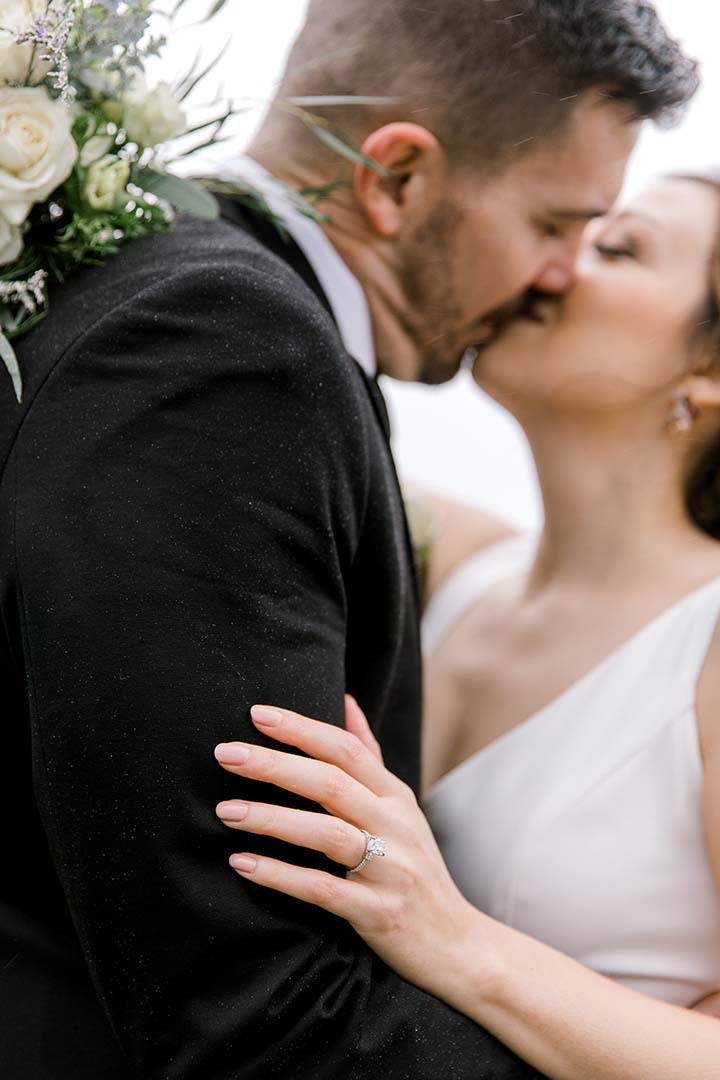 rockland maine wedding photographer captures newlyweds first kiss