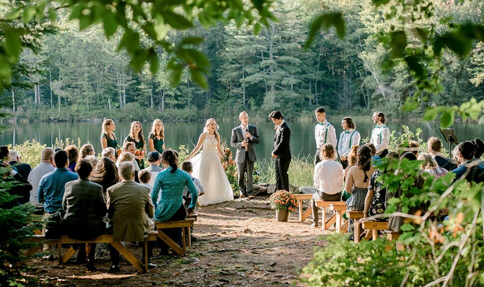 small intimate wedding ceremony on the waters edge of a private maine lake