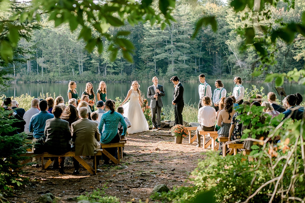 small intimate wedding ceremony on the waters edge of a private maine lake