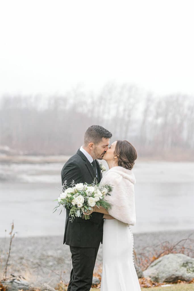 first kiss between bride and groom pre-wedding