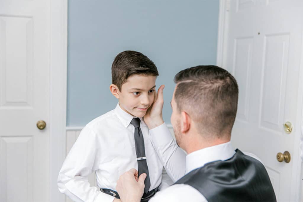 groom with son at breakwater inn and spa