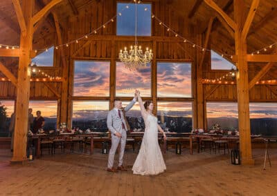 Photo a bride and groom in a lodge set up for a wedding by Maine wedding photographer Catherine J. Gross